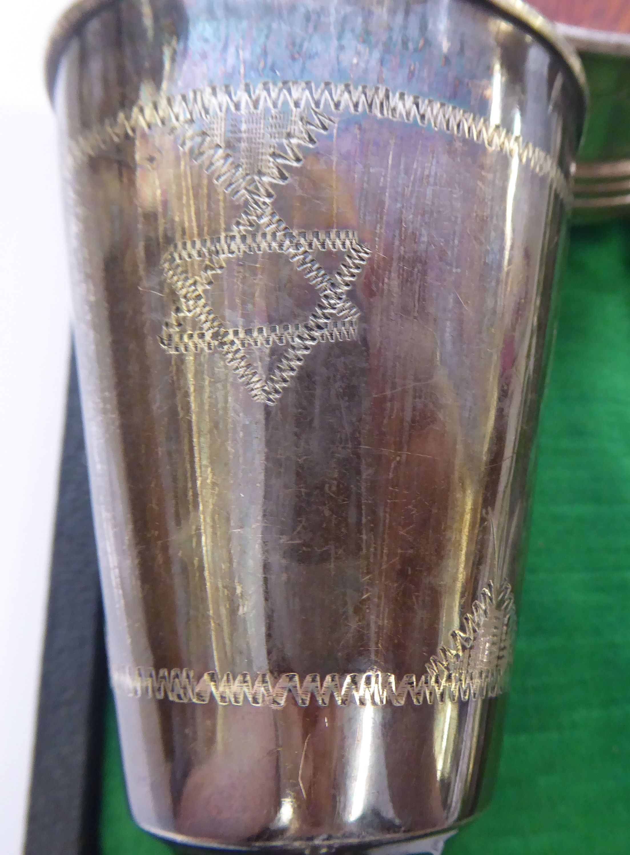 A silver Kiddush cup of tapered form, on a knopped stem; a silver wine coaster, on a turned mahogany - Image 2 of 3