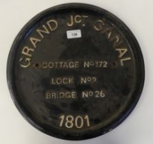 A cast iron plaque 'Grand Jct Canal'  14.5"dia