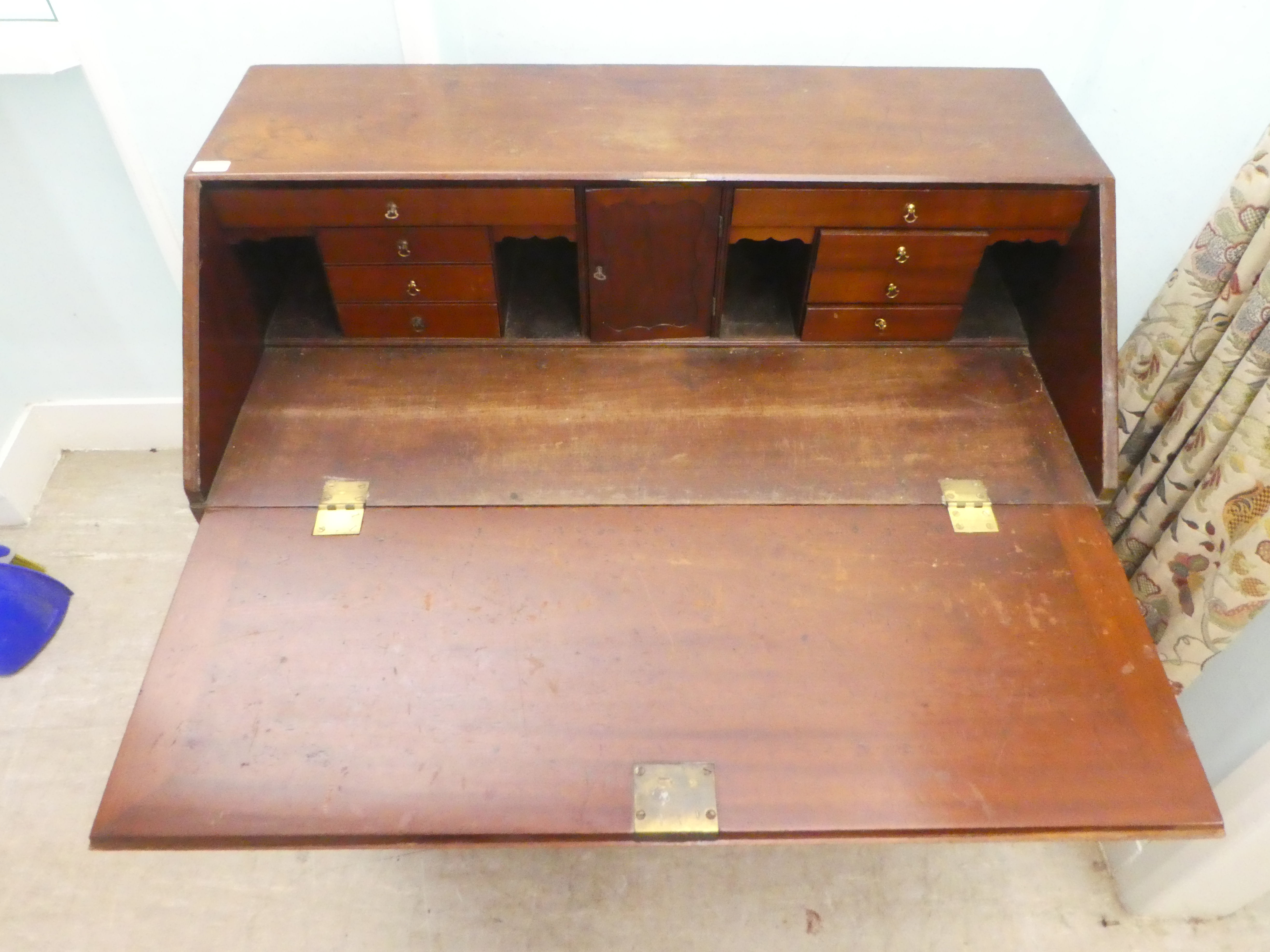 A 19thC mahogany bureau, the fall flap over two short/three graduated long drawers, raised on - Image 5 of 6