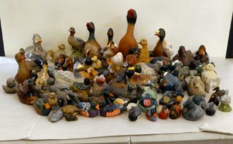 A miscellany of modern ceramic and wooden model ducks  various sizes