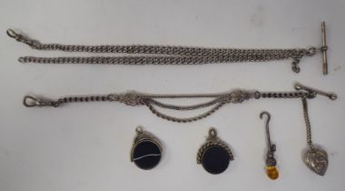 Silver and white metal jewellery: to include pendants and a button hook