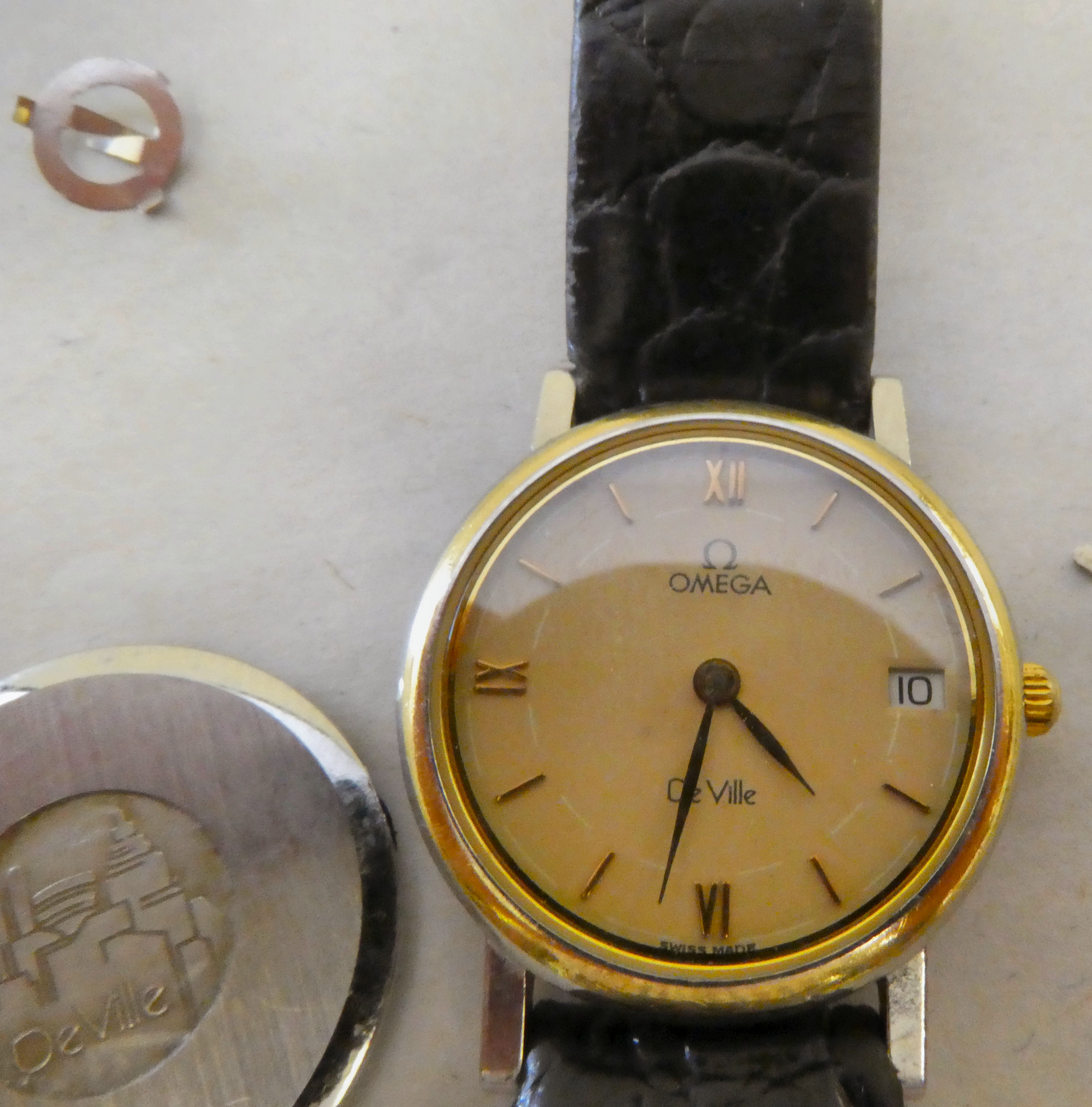 A ladies Omega Deville stainless steel cased quartz wristwatch, faced by a baton dial