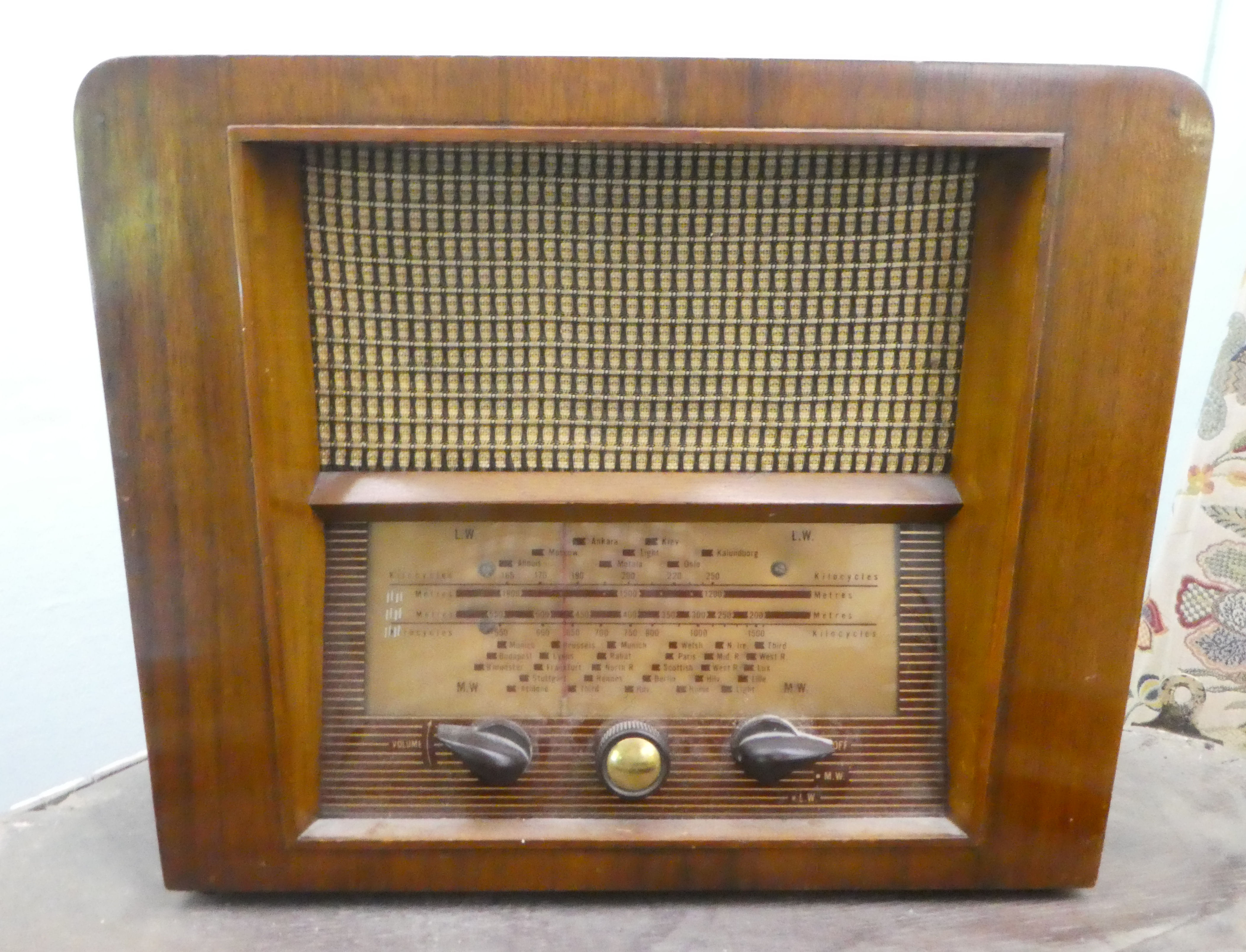 A vintage mahogany cased radio  11"h  12"w