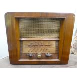 A vintage mahogany cased radio  11"h  12"w