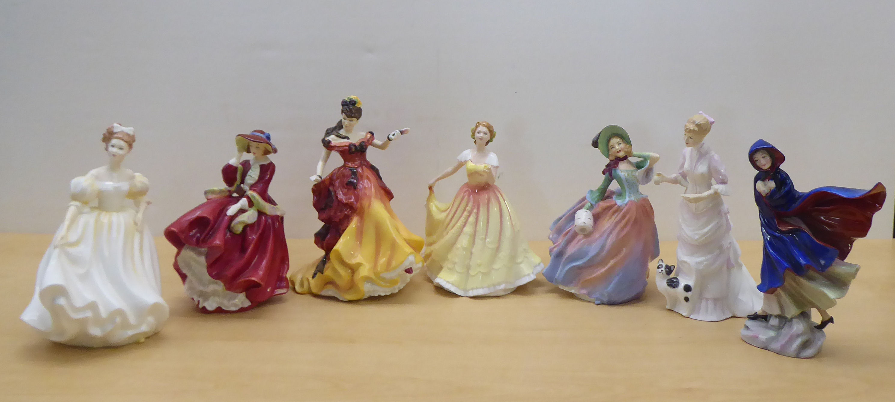 Seven Royal Doulton china figures: to include 'Autumn Breezes'  HN1911  7"h