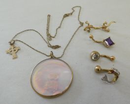 9ct gold and yellow metal items of personal ornament: to include a hologram pendant, set with an owl