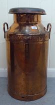 An early/mid 20thC Dried Milk Products copper twin handled milk churn  27"h