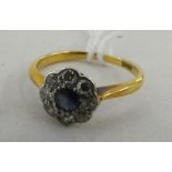 An 18ct gold diamond and sapphire cluster ring