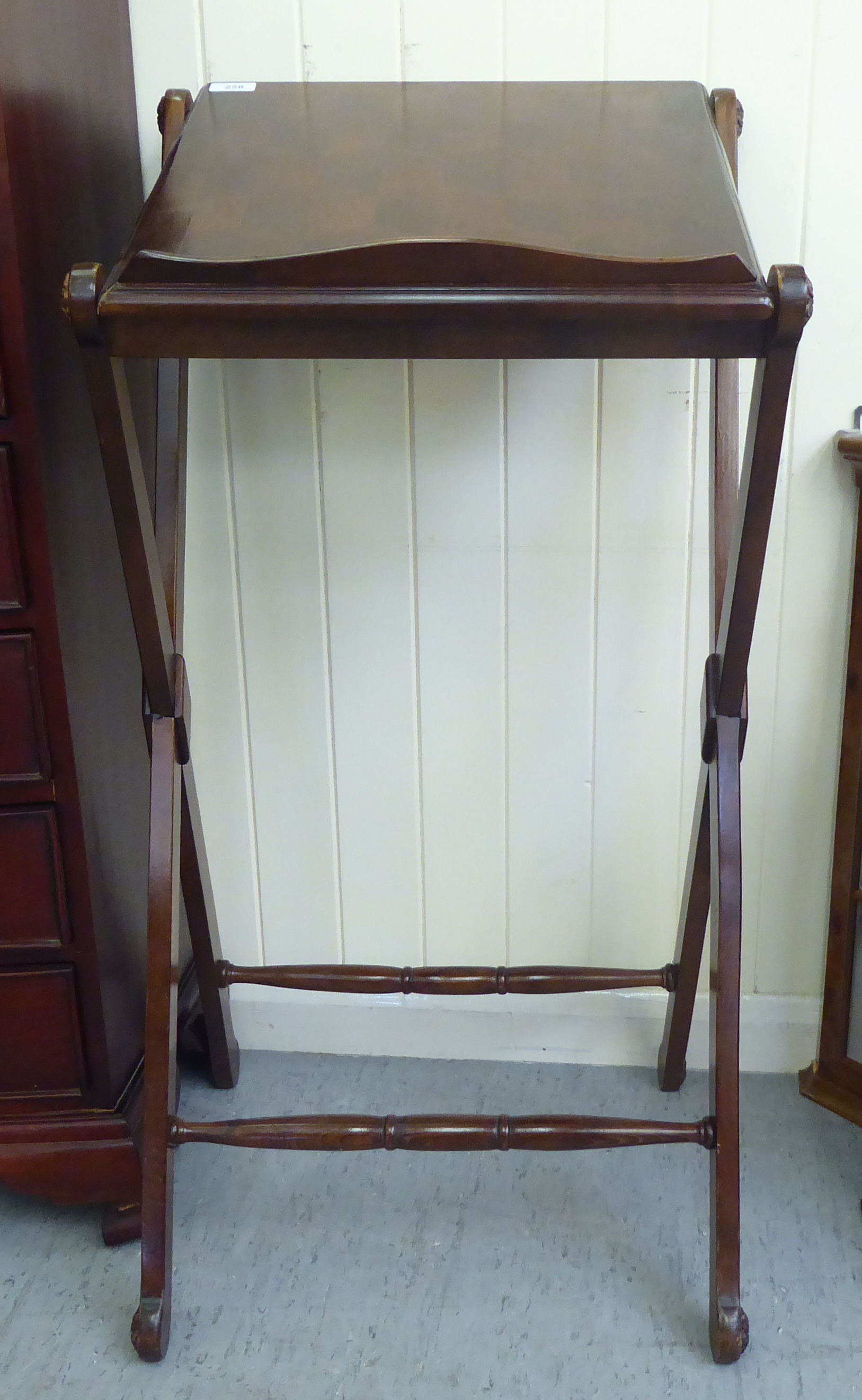 A modern mahogany lectern, on a stained beech crossover frame  38"h  19"w