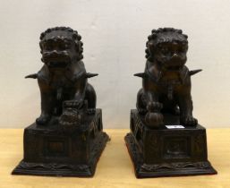 A pair of modern cast bronze Dogs of Fo, on fixed plinths  12"h overall