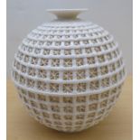 A cream coloured porcelain vase, fashioned as a woven basket of waisted baluster form  11"h