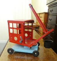 A Triang red and blue painted metal toy crane  12"h