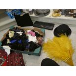 Textiles, some theatrical: to include a 1930s style black suede handbag; ostrich feather fans;