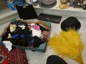 Textiles, some theatrical: to include a 1930s style black suede handbag; ostrich feather fans;