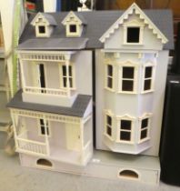 A modern classical Victorian design dolls house  32"h  33"w