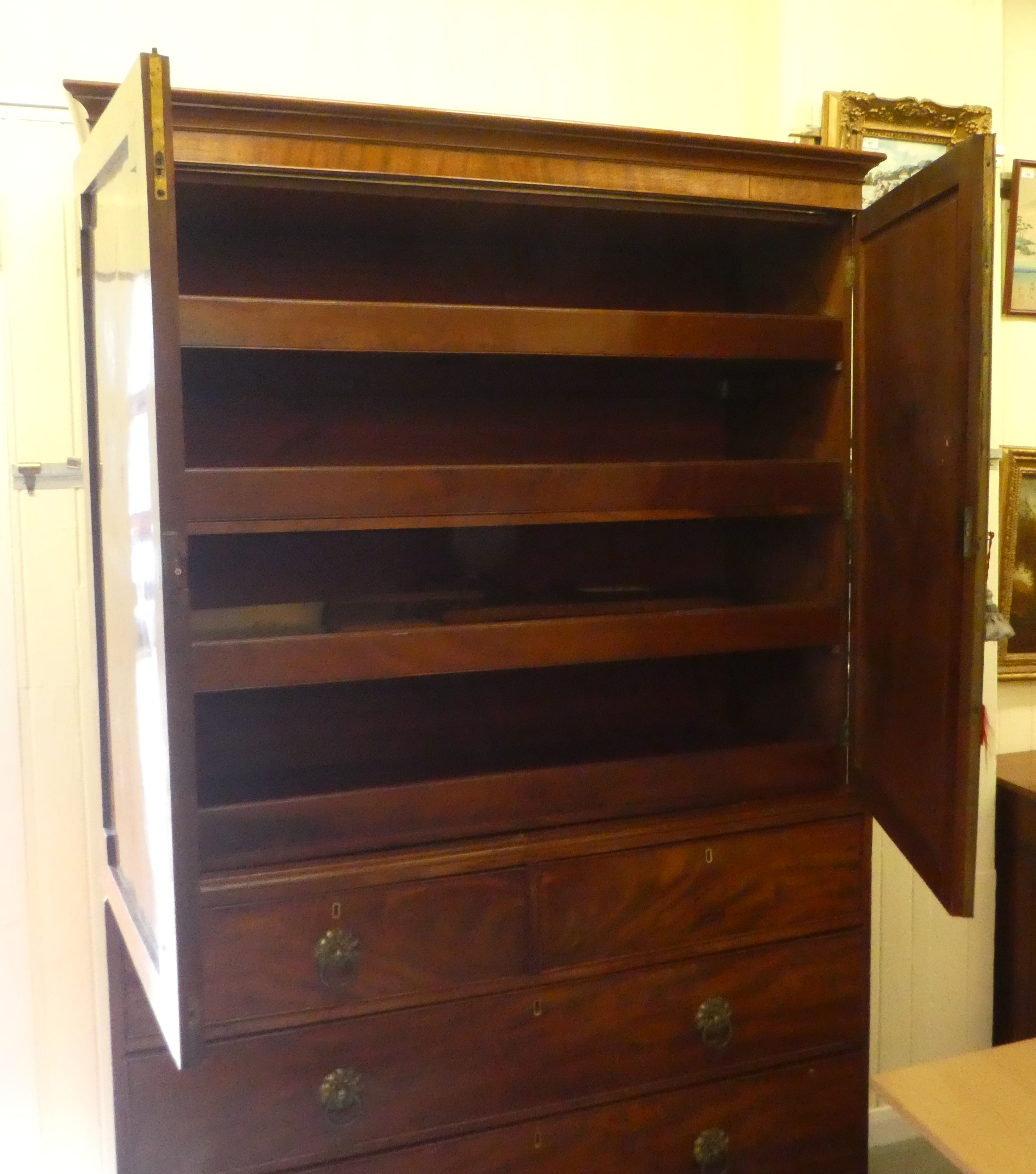 A late Victorian mahogany linen press with a moulded cornice, over a pair of panelled doors, two - Image 4 of 5