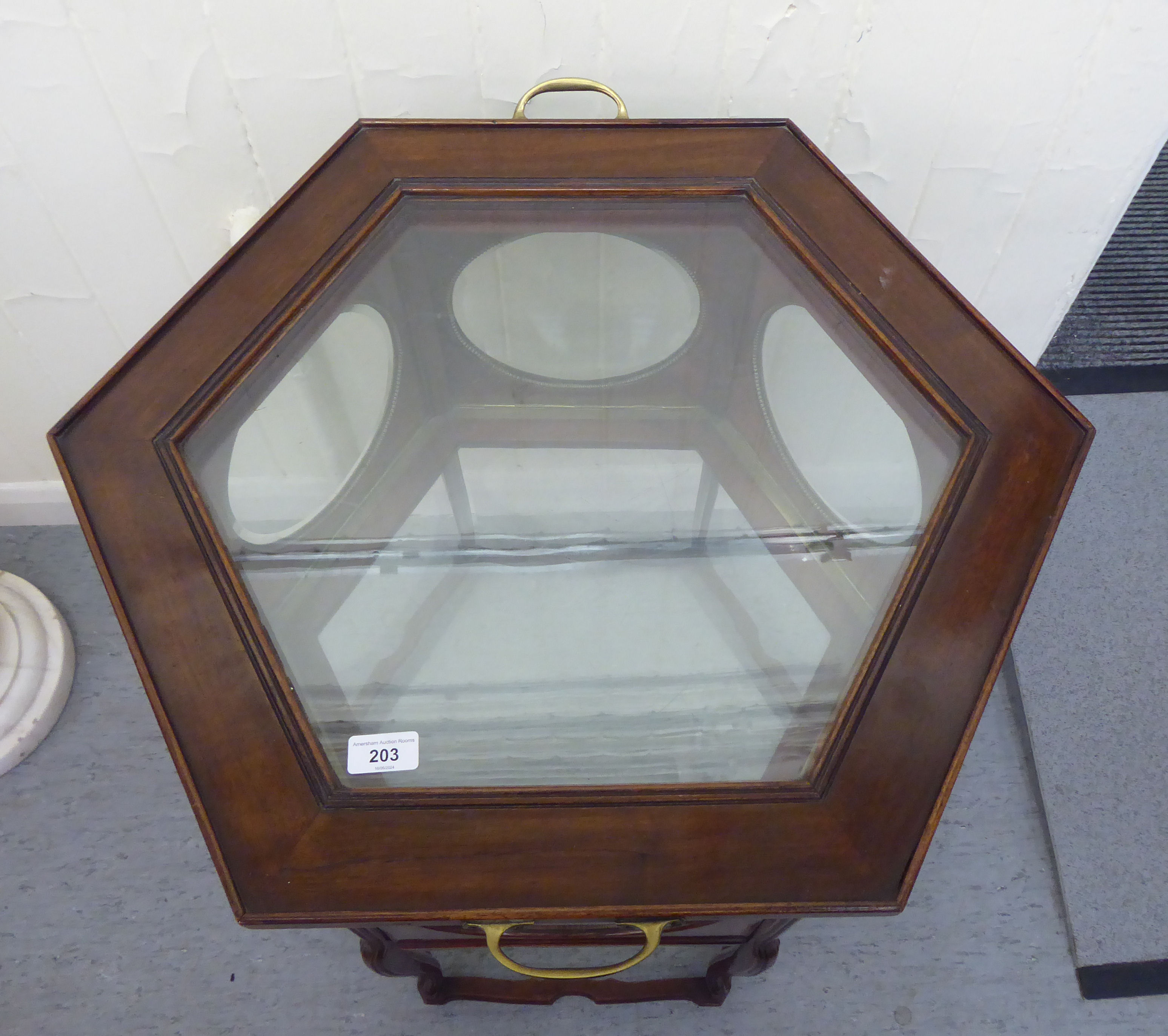 A 20thC mahogany framed and glazed panelled serving tray with a removable tray top and six hinged - Image 2 of 6