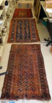 Four dissimilar Persian rugs  largest 39" x 72"