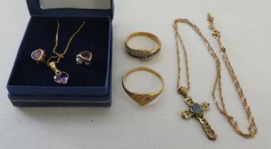 9ct gold and yellow metal items of personal ornament: to include a signet ring; and a pendant cross,