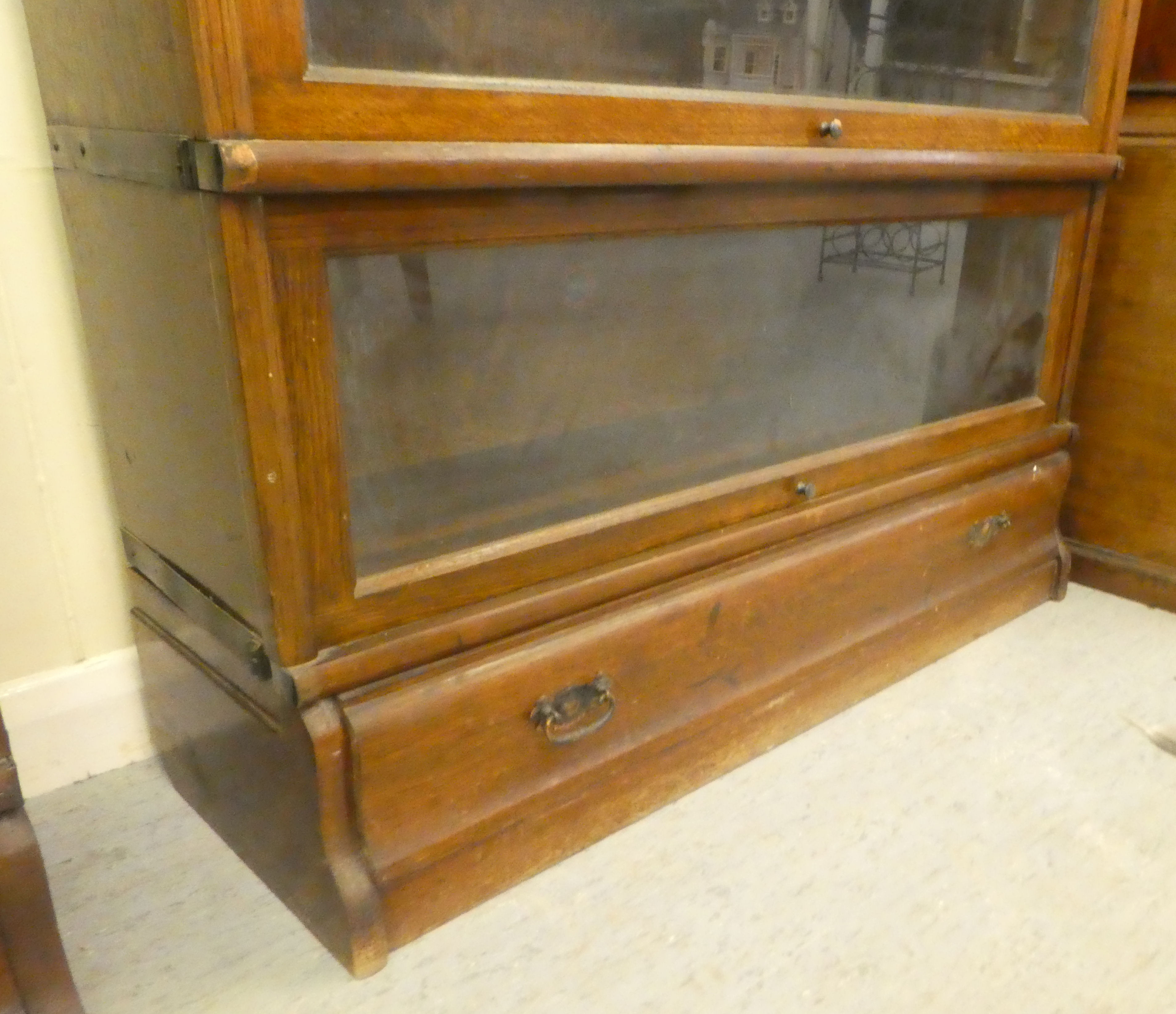 A 1920s/30s oak Globe Wernicke four section bookcase with lift and slide doors and a base drawer, on - Image 3 of 4