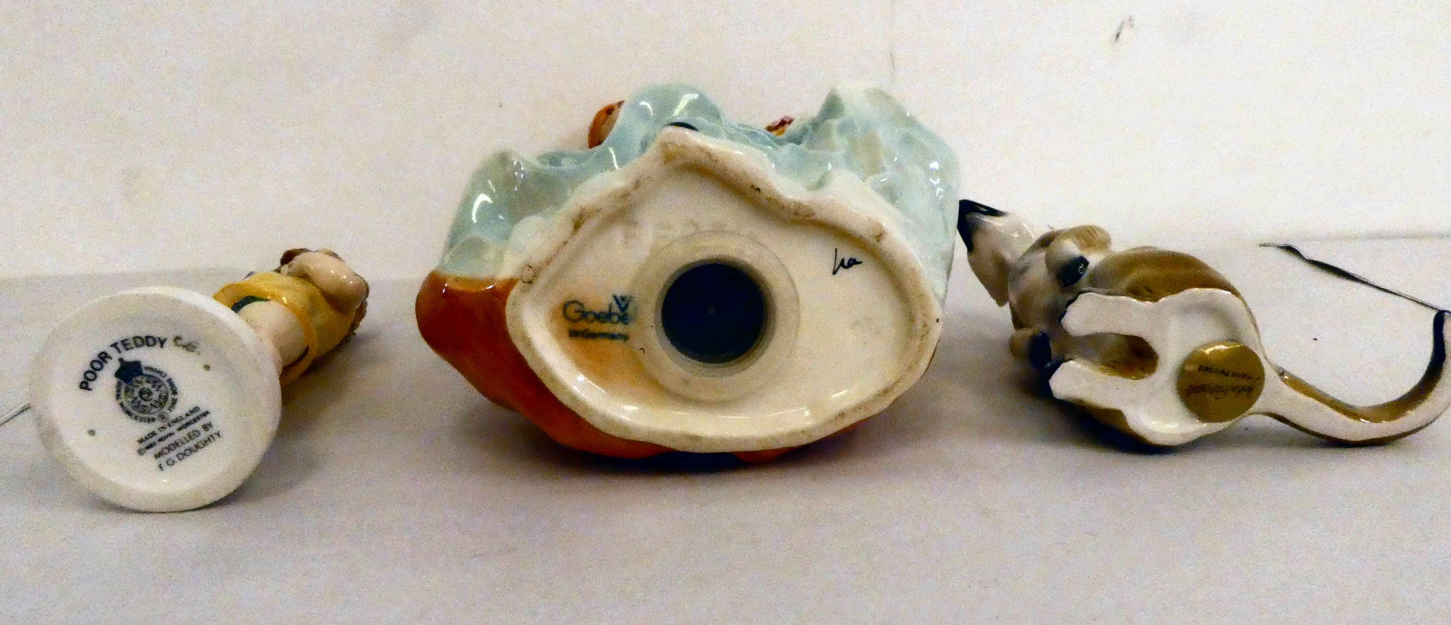 Ceramic ornaments: to include a Goebel china female figure  8"h; a Royal Worcester porcelain 'Poor - Image 4 of 5