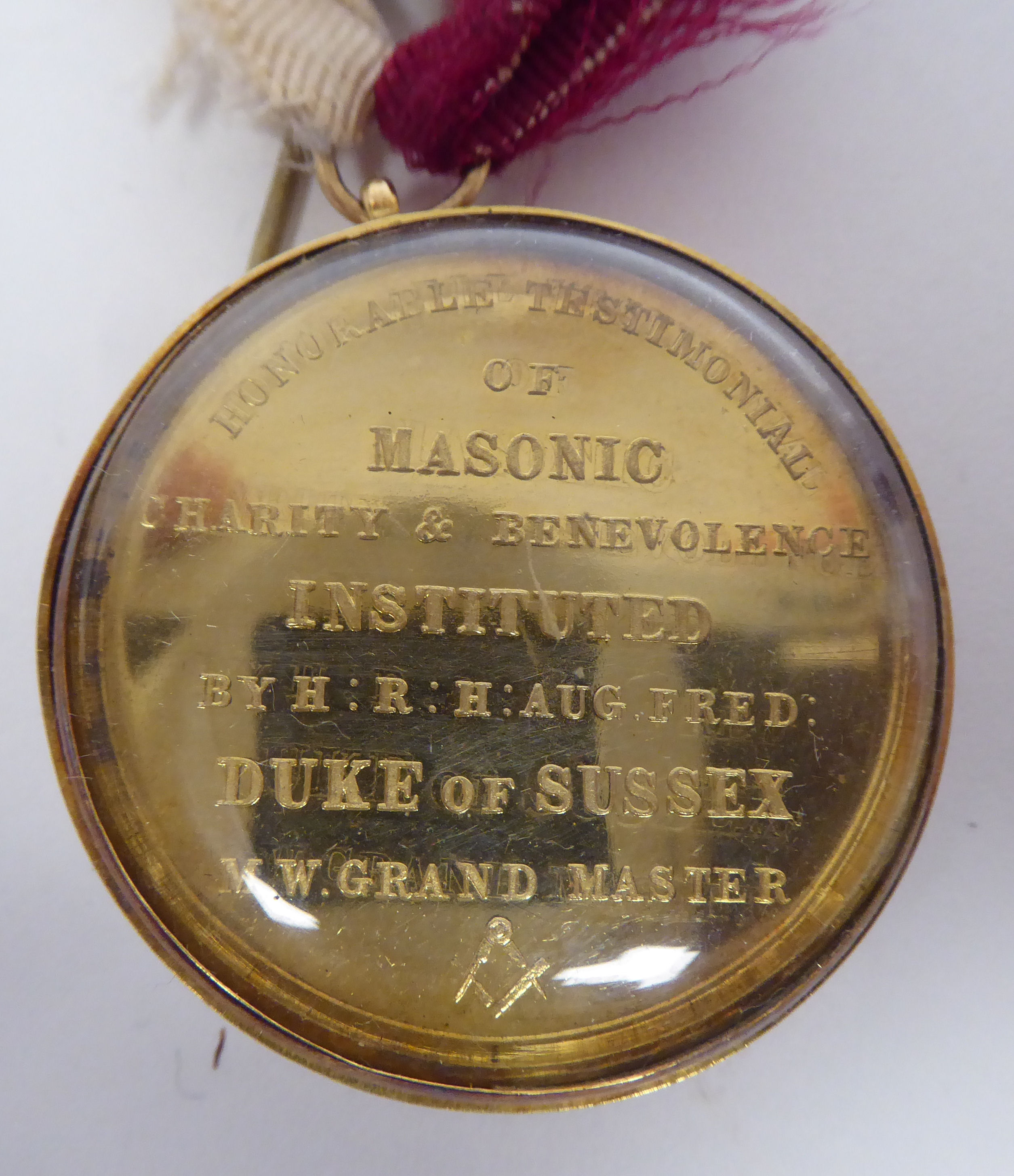 An Honourable Testimonial of Masonic Charity & Benevolence medal, in a 15ct gold mount, inscribed - Image 2 of 3