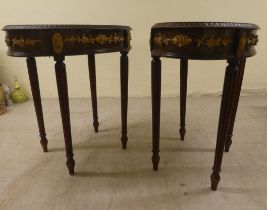 A pair of mid 20thC Louis XVI design walnut lamp tables, each raised on turned, fluted legs  19"h