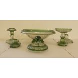 Matched, tinted green engraved cut glass  comprising a pair of candlesticks  5"h; a bowl  12"dia;