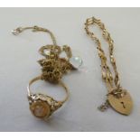 9ct gold and yellow metal items of personal ornament: to include a child's bracelet; and a shell