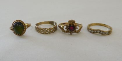 Four dissimilar 9ct gold rings: to include one cast in Celtic taste