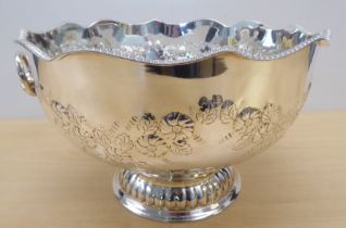 A Georgian design silver plated on copper pedestal punch bowl with opposing lion mask handles  8"