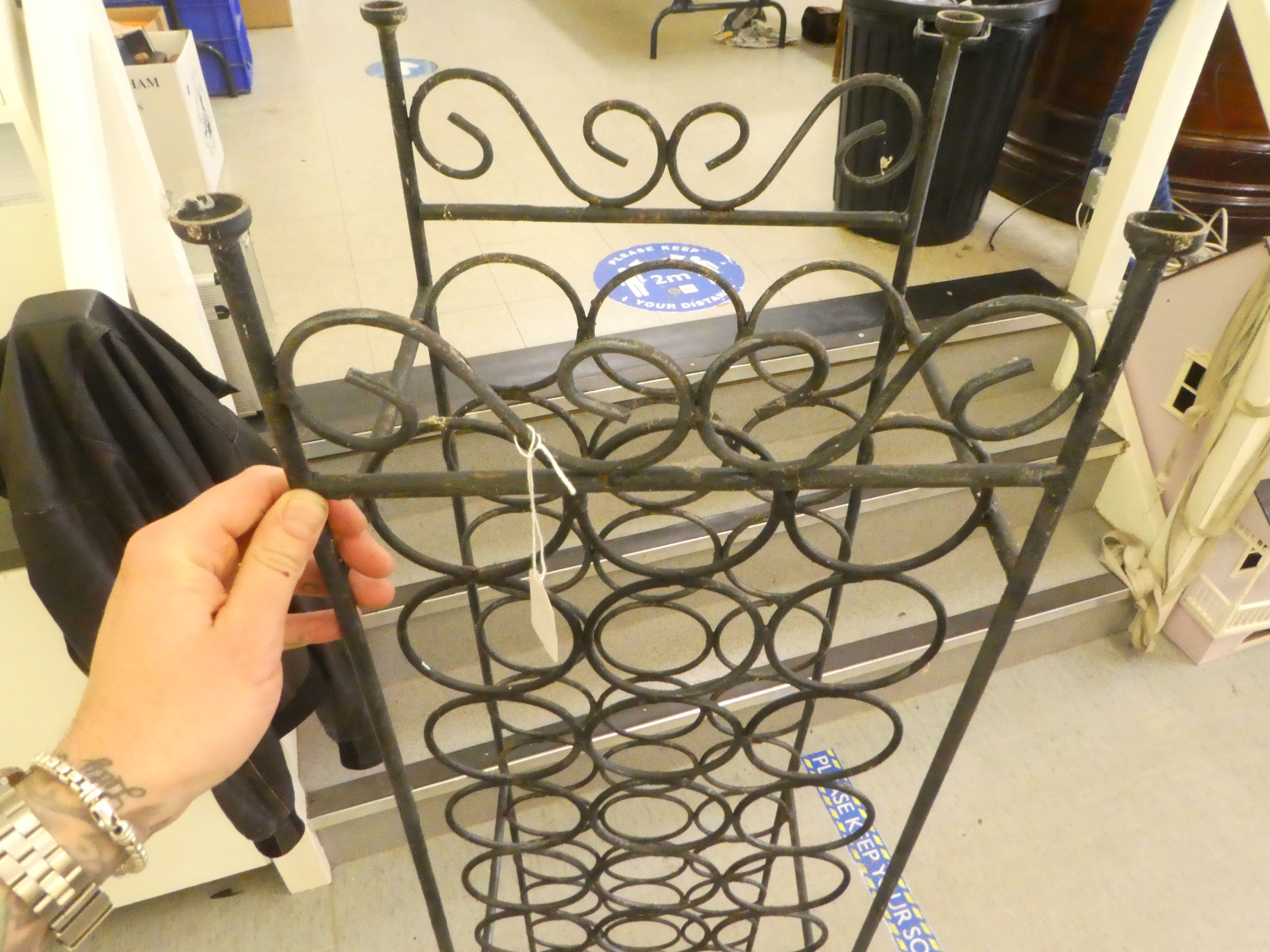 A wrought iron freestanding wine rack, accommodating 39 bottles  59"h  13"w - Image 3 of 3