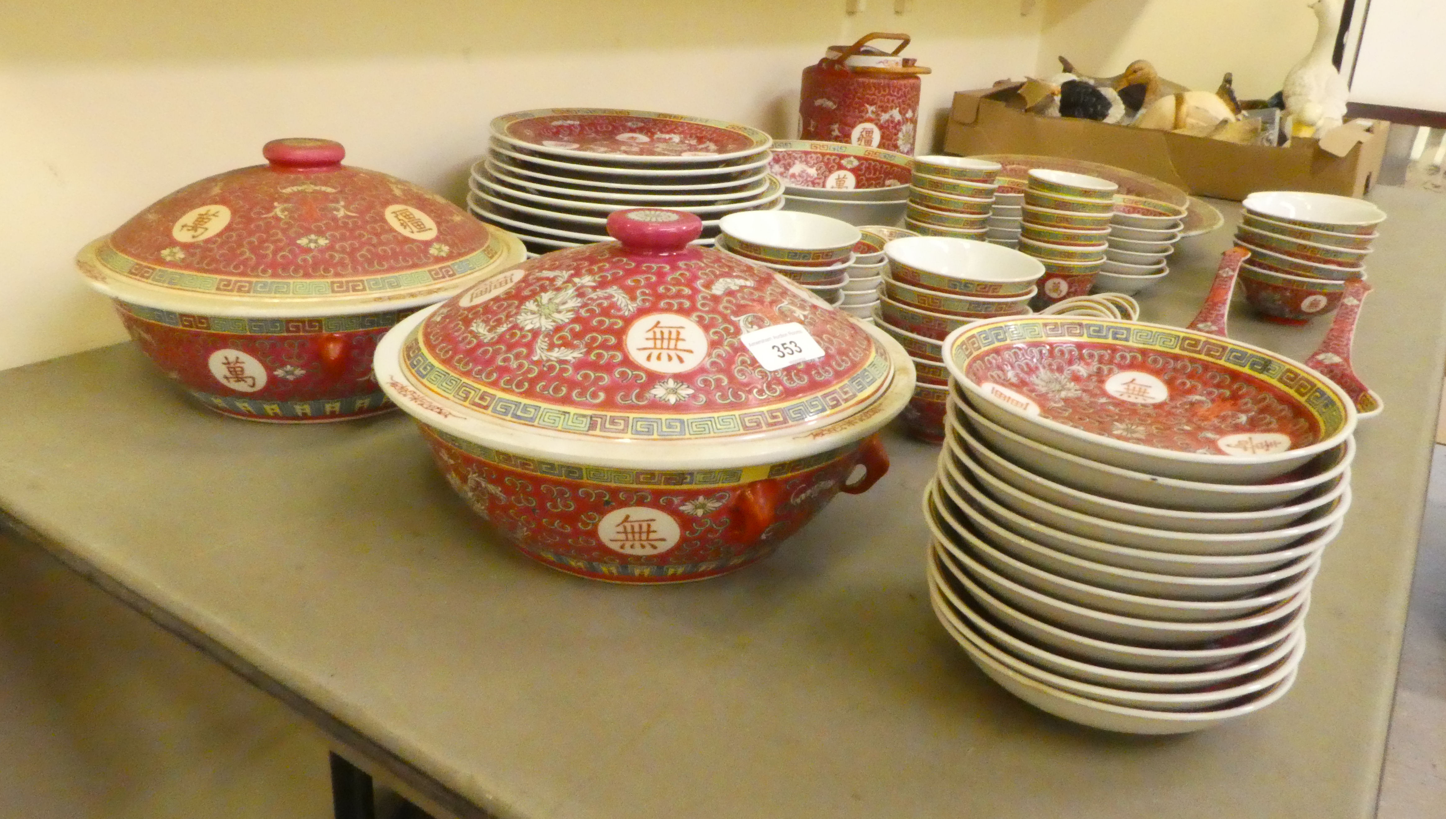 A mid 20thC Chinese porcelain dinner service, decorated with maroon flora and characters - Image 6 of 8