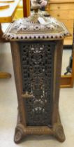 A 20thC cast iron tower design stove  31"h