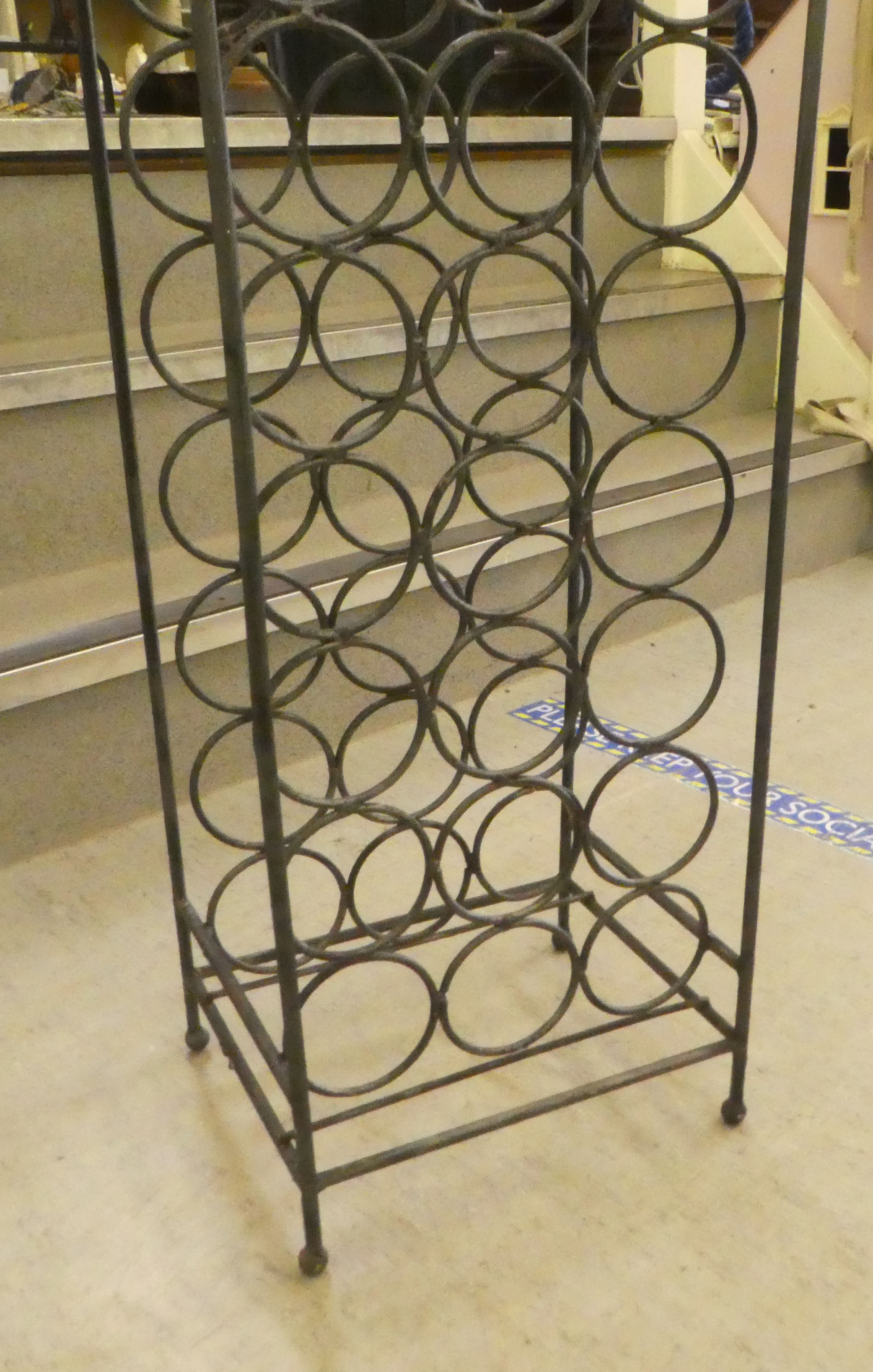 A wrought iron freestanding wine rack, accommodating 39 bottles  59"h  13"w - Image 2 of 3