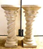A pair of chalk coloured composition stone pedestals  26"h