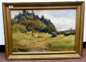 Robert Jobling - cattle grazing in a woodland landscape  oil on canvas  bears a signature  15.5" x