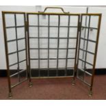 An Edwardian tubular brass, the three fold firescreen, comprising multiple  3"sq, bevelled, clear