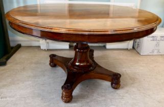 A William IV rosewood centre table with a thumb moulded border and straight, cockbeaded frieze, over