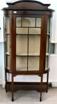 An Edwardian boxwood string inlaid mahogany D-shape display cabinet with a low upstand, over a