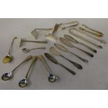 19th and early 20thC silver flatware: to include a set of three Old English pattern condiments