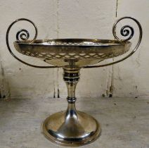 A silver sweet dish, the shallow bowl with a pierced border and twin, scrolled wire handles,