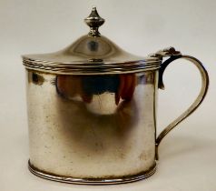 A Georgian style silver oval mustard pot with applied wire ornament, a hinged lid and loop handle