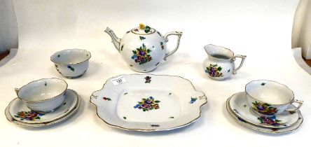 A Herend porcelain cabaret set, decorated in moulded basketweave with floral sprigs and gilding