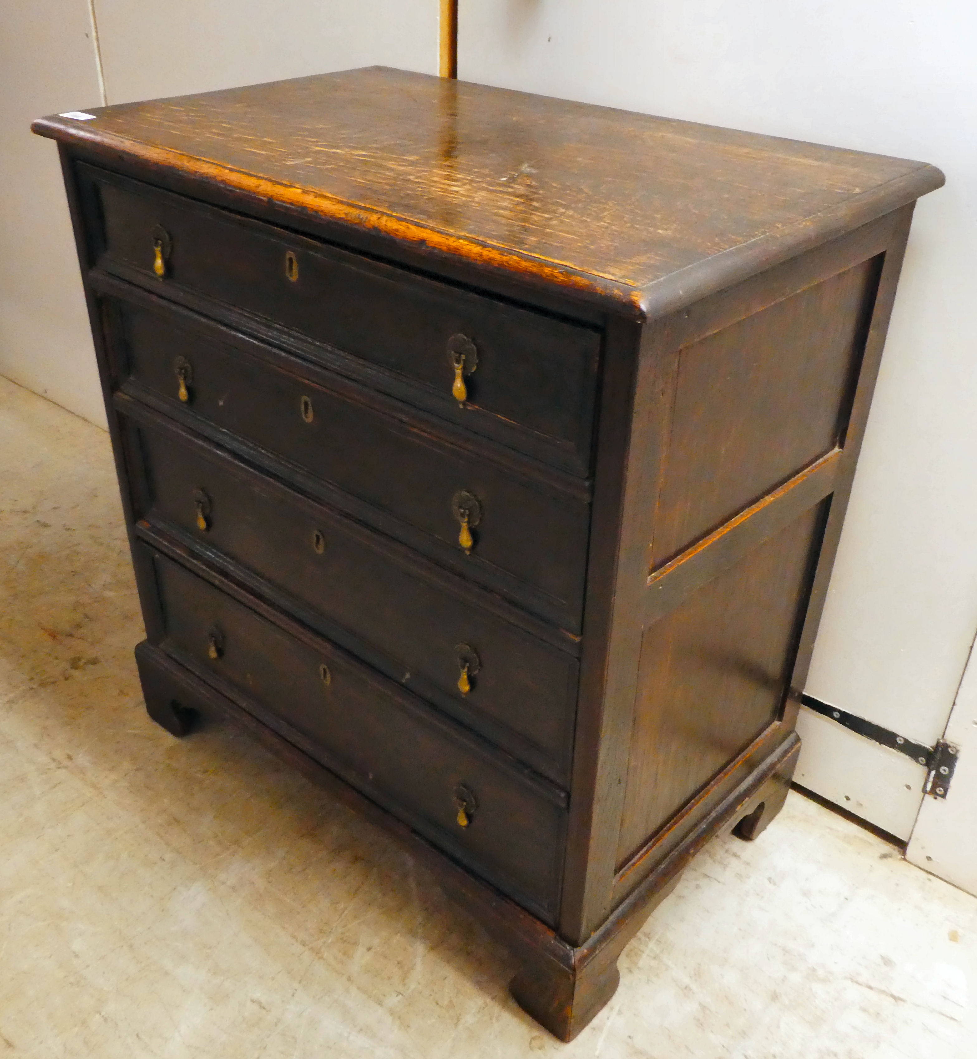 An early 19thC stained oak dressing chest with graduated four drawers, raised on bracket feet  31"h - Image 3 of 4