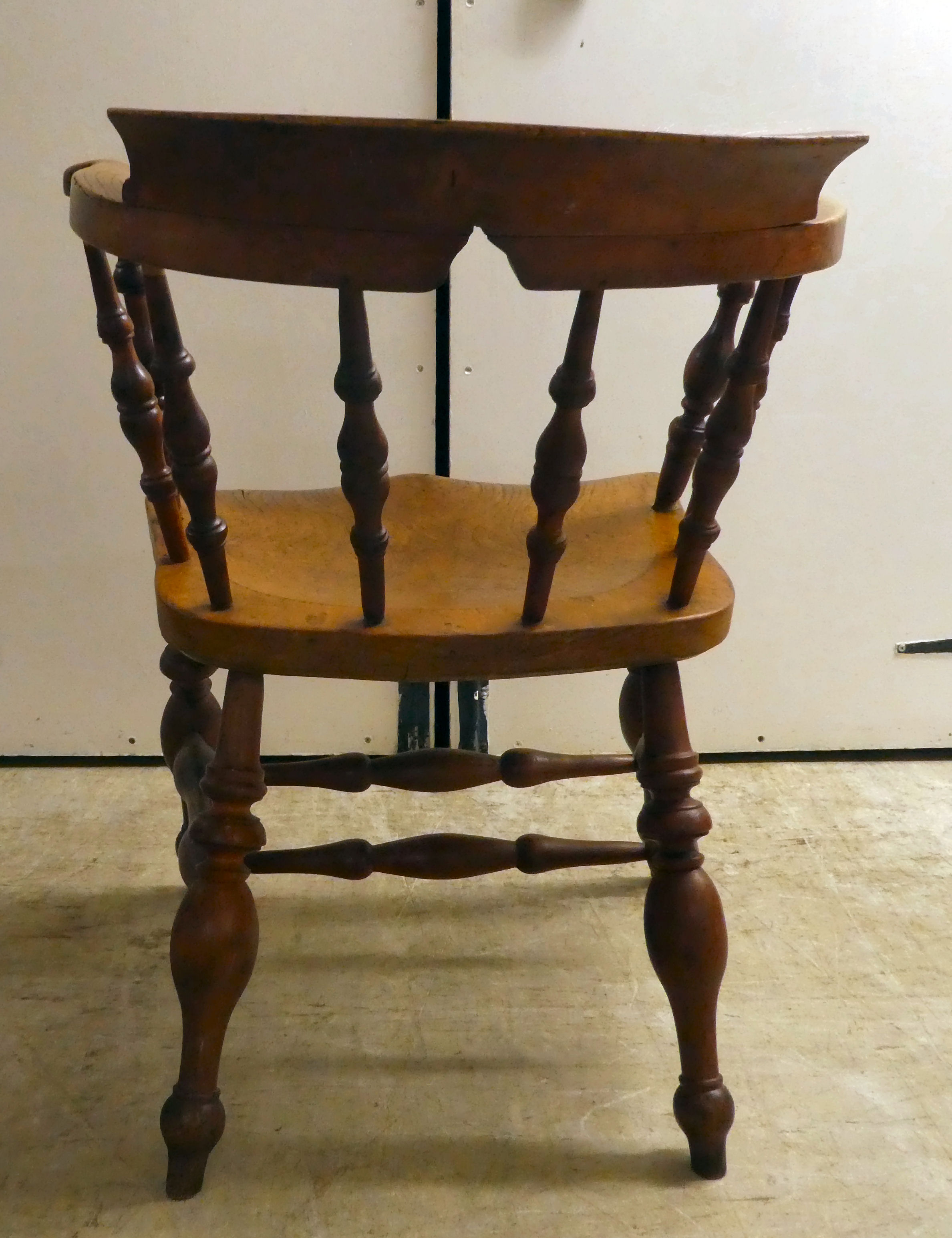 An early 20thC beech and elm framed captain's design desk chair, the solid seat raised on turned - Image 4 of 5