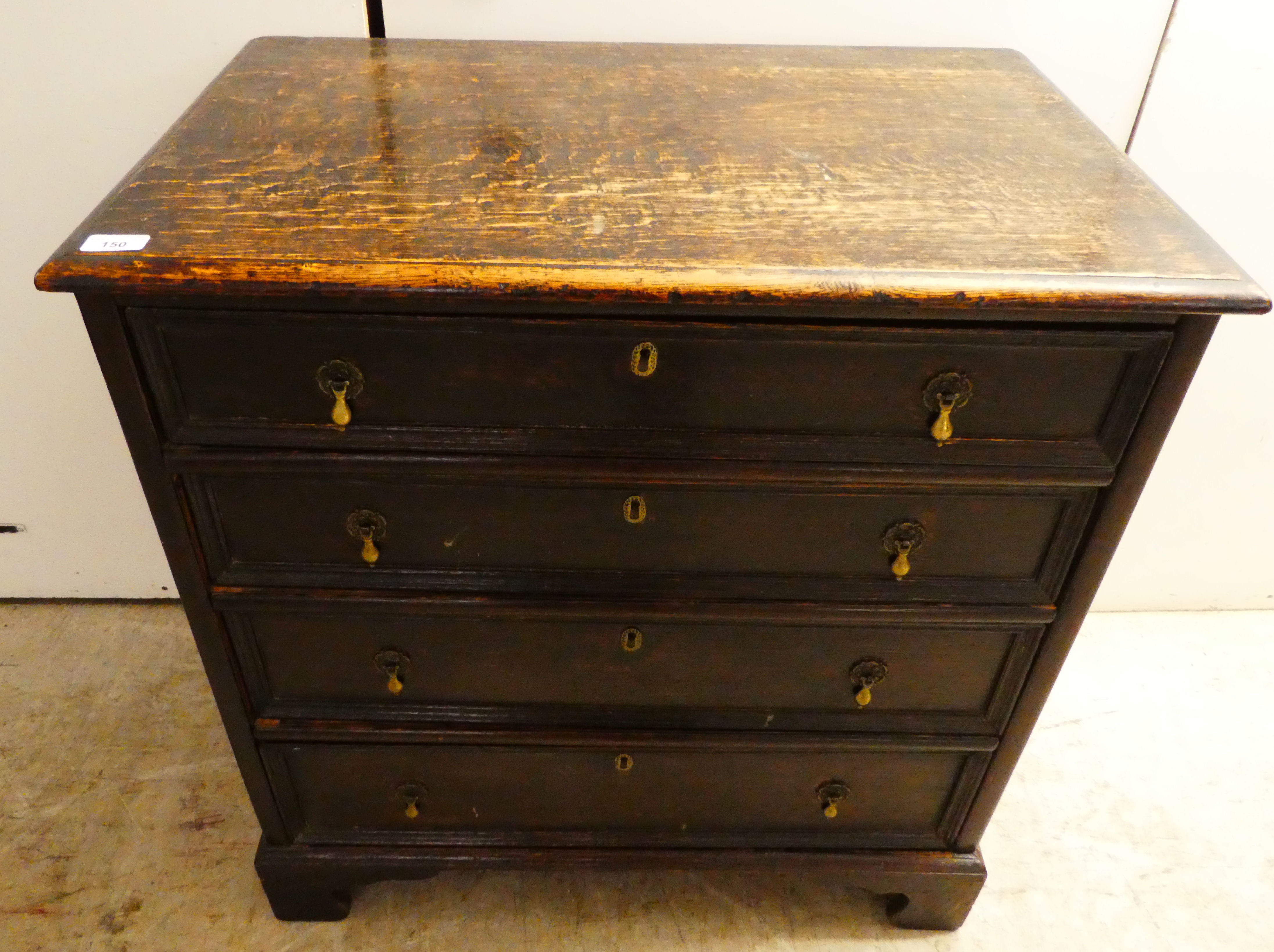 An early 19thC stained oak dressing chest with graduated four drawers, raised on bracket feet  31"h - Image 2 of 4