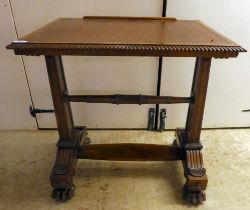 An early Victorian burr walnut writing table, the top with a hinged, tooled scriber, over opposing