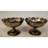 A pair of silver pedestal sweet dishes with impressed diamond formation decoration and applied