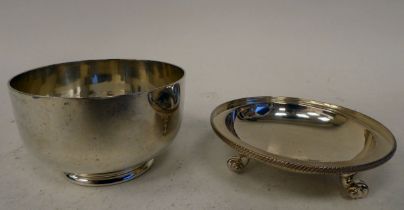 A silver footed bowl, on a deep, stepped footrim  4"dia; and a silver paten, elevated on scrolled